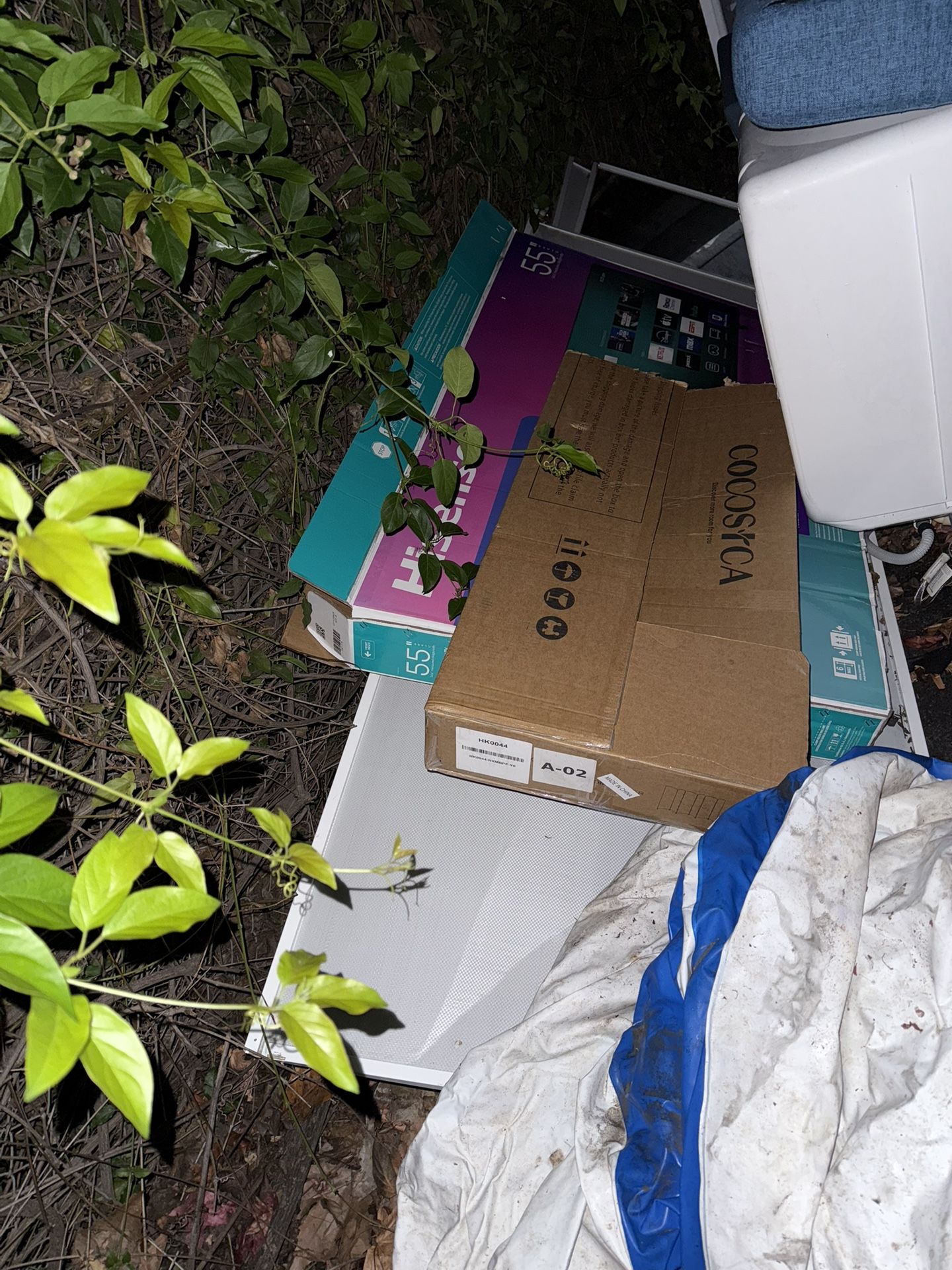 Empty box for Hisense 55-inch TV, empty long, flat Target box, and Smaller Long, Flat Box.