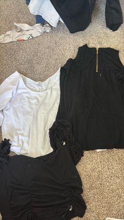 White bodysuit, black top and a long sleeve black top