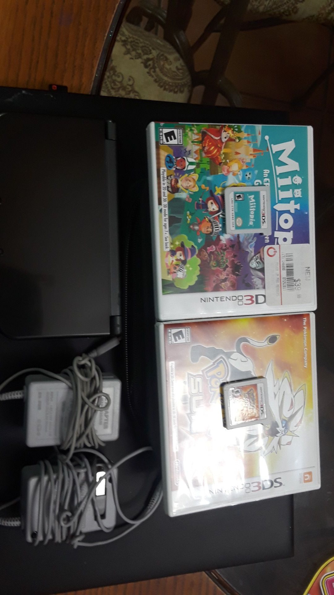 Nintendo 3ds XL with case, two games, and two chargers