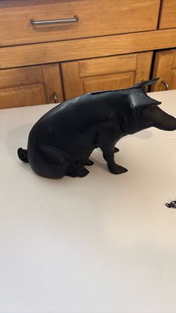 Vintage Antique Black Cast Iron Piggy Bank. Measures 10x5. This Can Be Used As a door stop