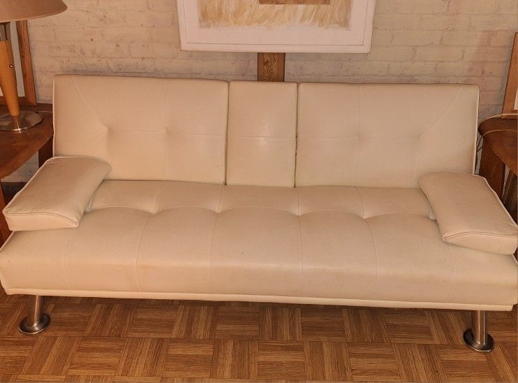 White faux leather futon