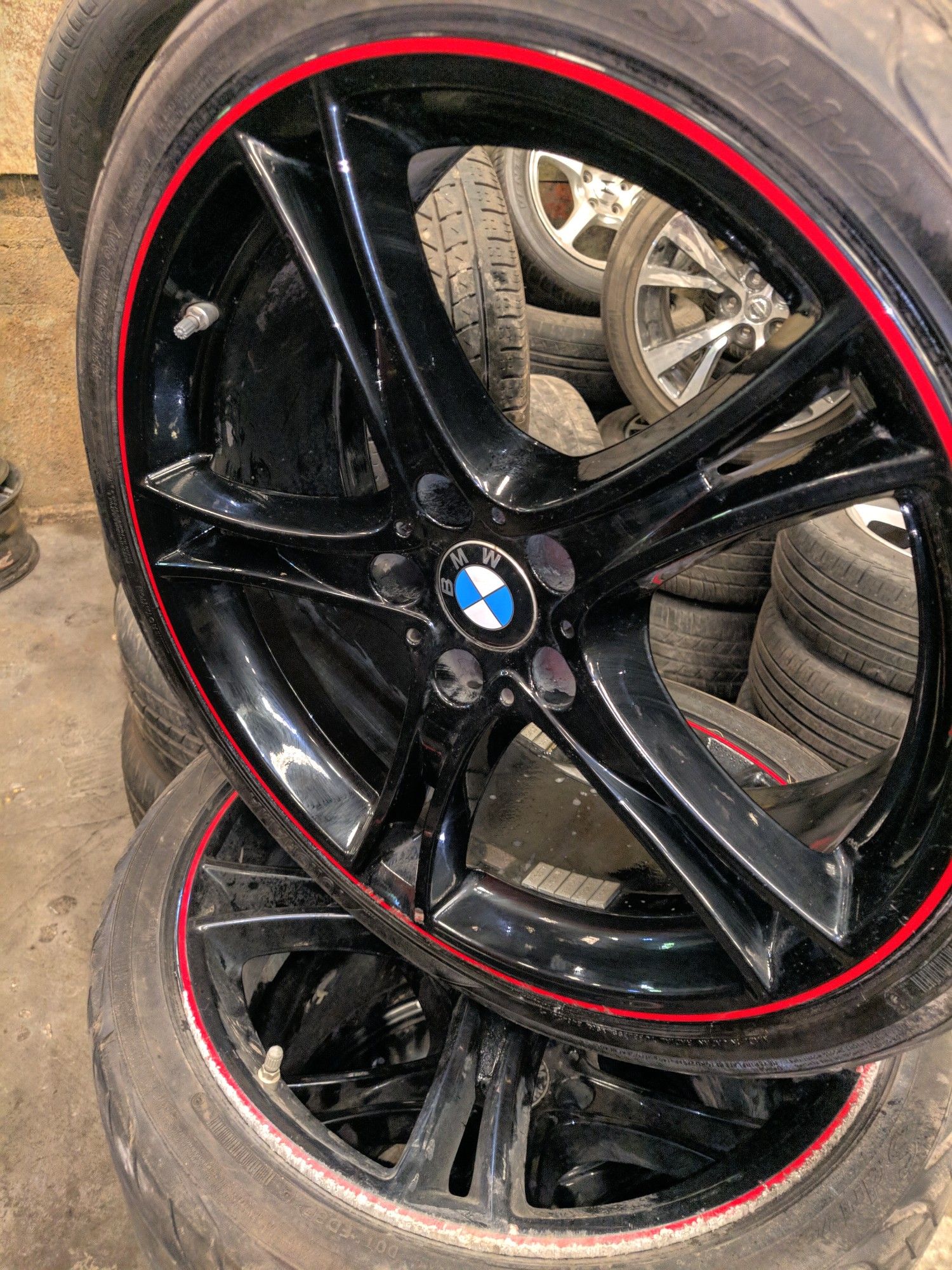 BMW F30 3-series 20" Black Rims with Red Stripe.