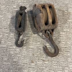 2 old barn house pulleys