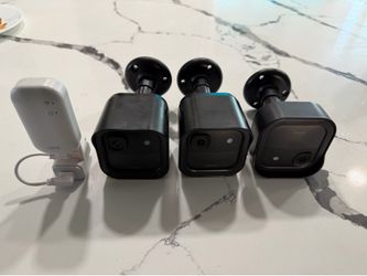 Blink Sercurity Cameras with battery extenders.