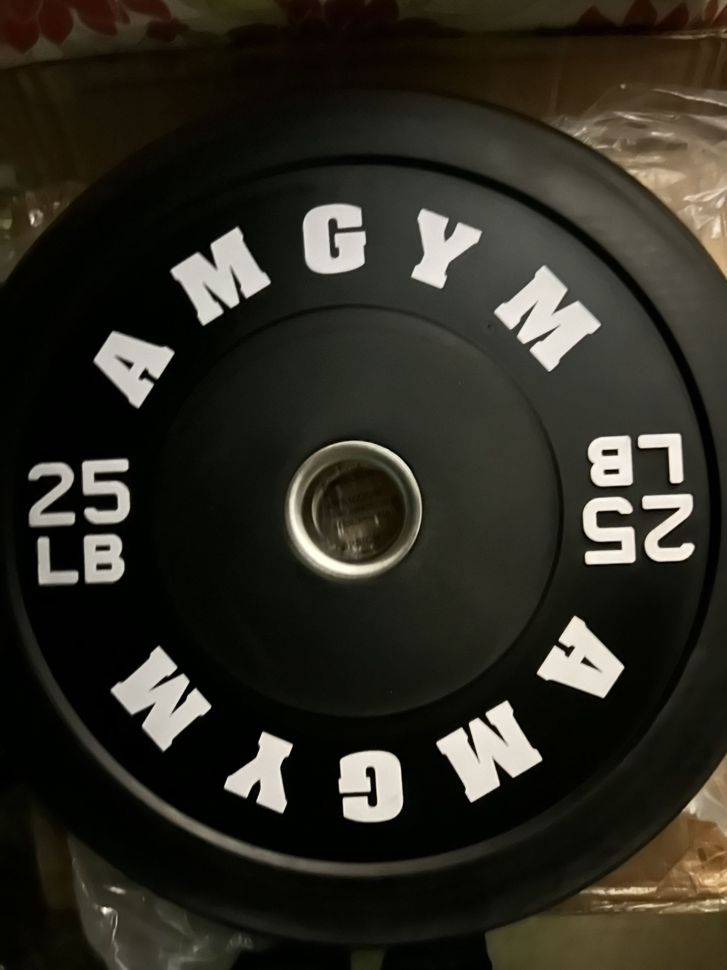 A pair of 25 pounds each bumper plates