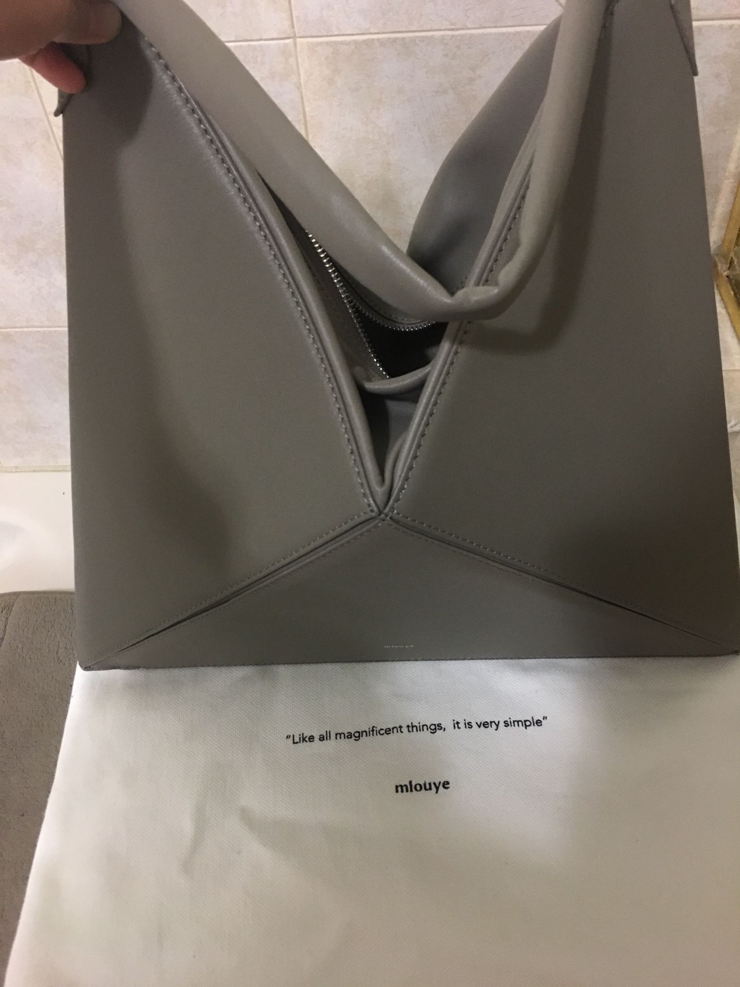 Mlouye triangle bag