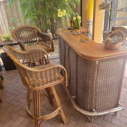 Rattan patio bar and 3 stools