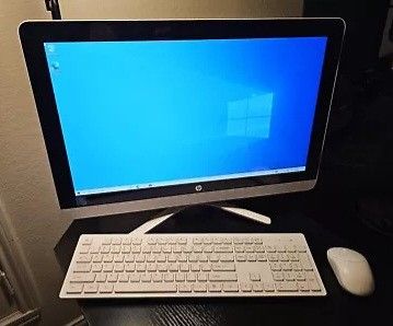 HP 22 Inch Touchscreen All In One PC Intel Quad Core 4 GB RAM 1000 GB HD DVDRW Webcam HDMI Wi-Fi & Bluetooth Wireless Windows 10 64 Bit OS