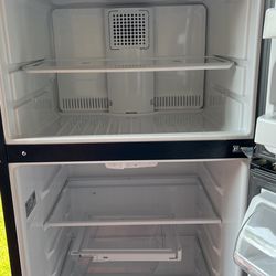 A Black Refrigerator Six Months Old I Paid $900 For it I Only Want $400.