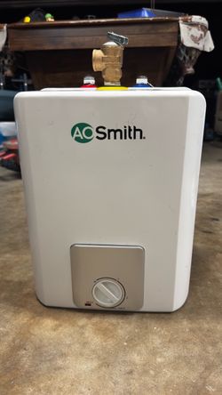 Compact electric water heater
