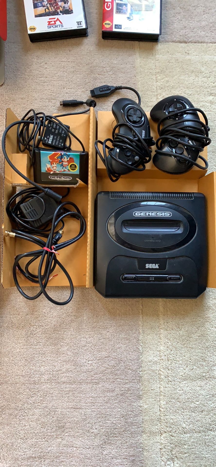 Sega Genesis gaming system with original box, 2 controllers and 5 games