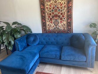 Royal blue sofa with reversible  chase
