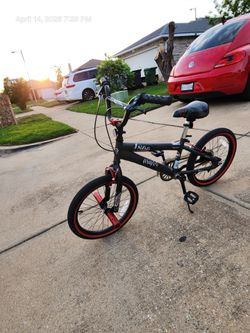 Red and Black colored Bike