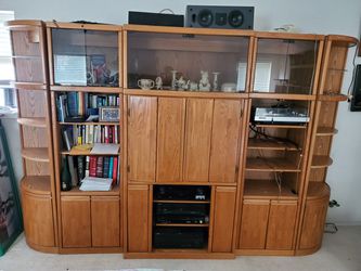 Large entertainment center with end bookshelves storage