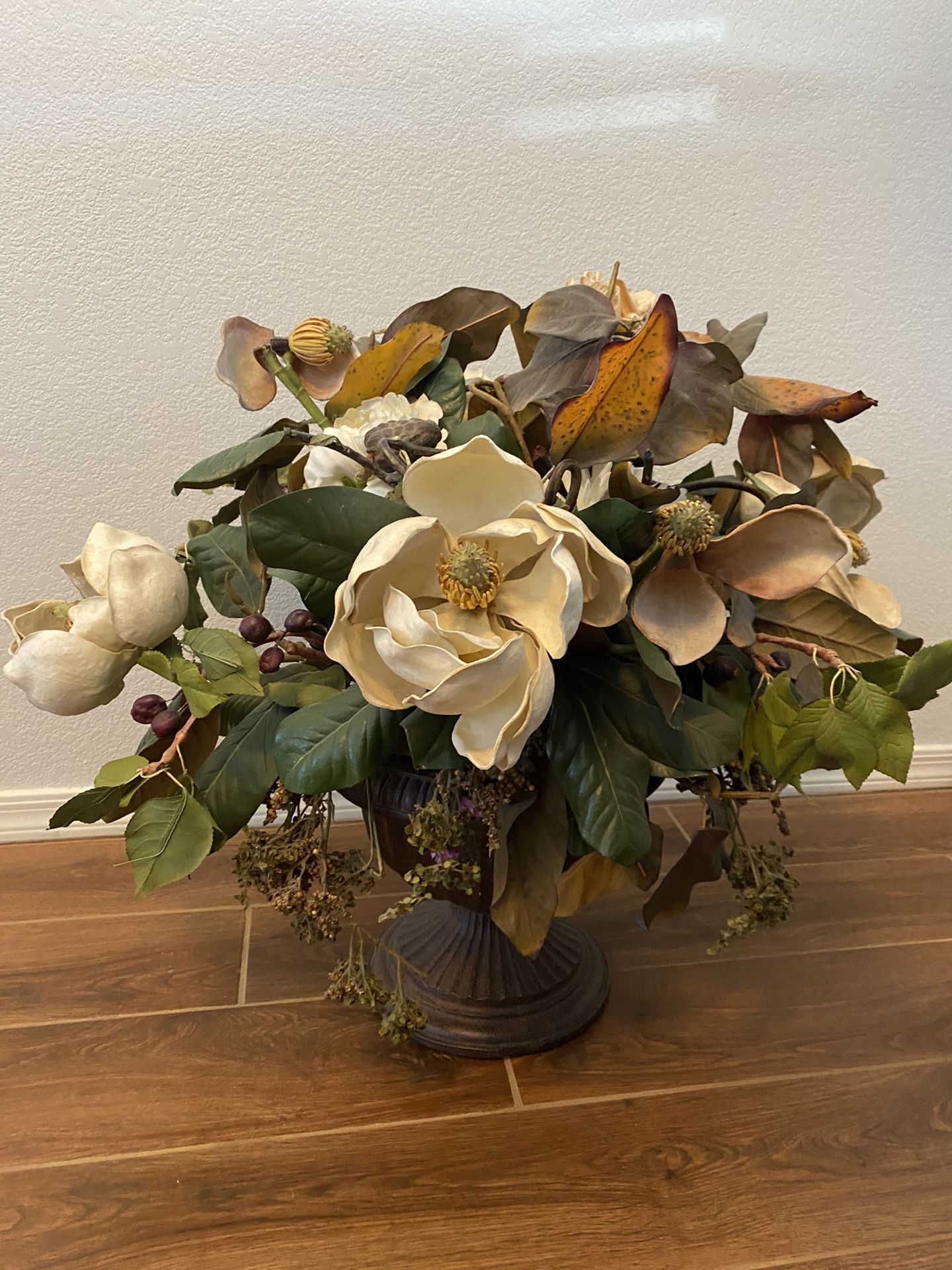 Large dried flower arrangement with vase