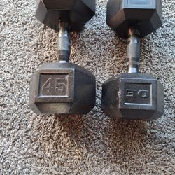 Rubber Hex  Dumbbells 1x45 Pouns  1x30 Pouns  No Sets.