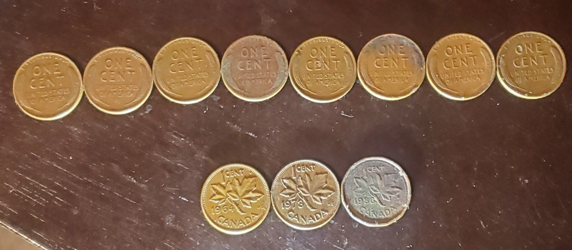 3 Canada pennies, 8 wheat pennies