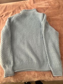 Turquoise knitted sweater