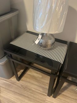 Black coffee table with glass top