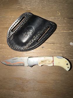 Custom pocket knife with leather sheath
