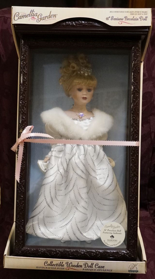 New Genuine Porcelain Doll