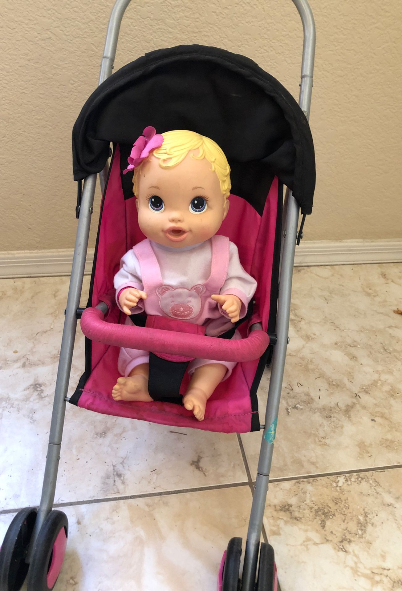 Stroller and doll