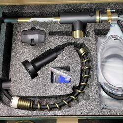 Androme Pull-down Kitchen Sink sprayer faucet in black and gold with deckplate