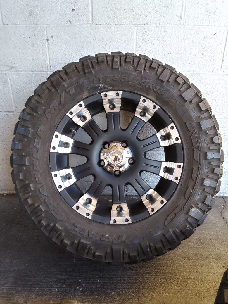 Like new 18" off road rims with nitto trail grappler tires