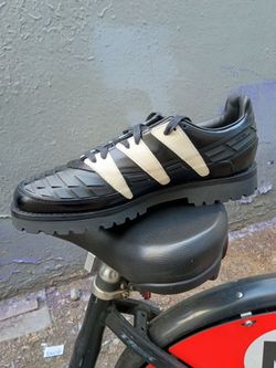 Adidas collaboration braindead and Disney raptor 90s style shoes