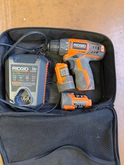 Ridgid cordless drill with charging station