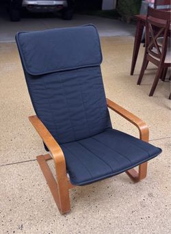 IKEA POÄNG Armchair with dark blue Cushion