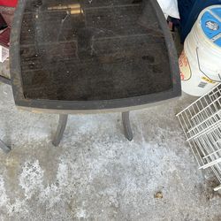 Patio table with smoked glass