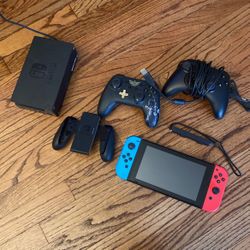 Nintendo Switch With Controls And 1 Game