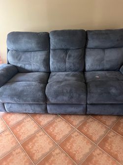Couch. Recliner in each side