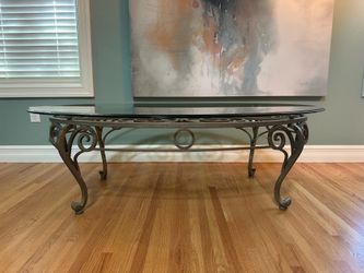 Beautiful glass coffee table with wrought iron base