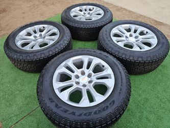 CHEVY SILVERADO WHEELS WITH GOODYEAR WRANGLER AT TIRES IN GREAT CONDITION
