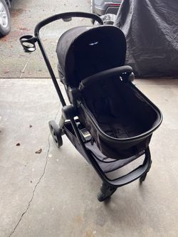Maxi Cosi stroller.