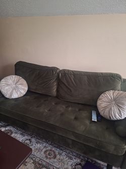 Moss green velvet sofa