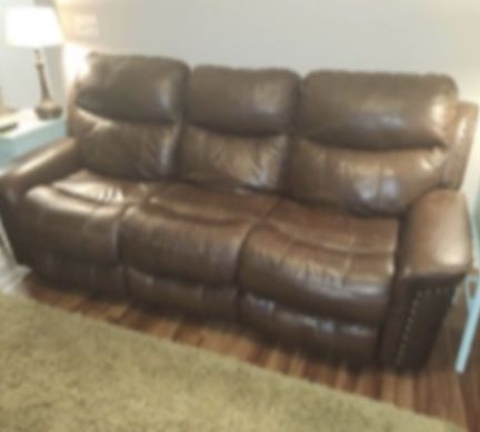 Like New Leather Electric Reclining Sofa
