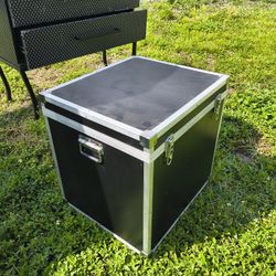 transport case, often referred to as a road case or flight case, designed to protect valuable equipment. 