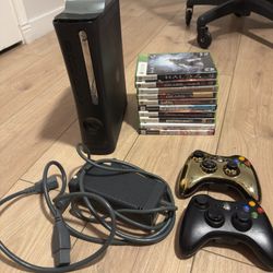 Xbox 360 With 60 GB Attachment, 2 Controllers And 10 Games