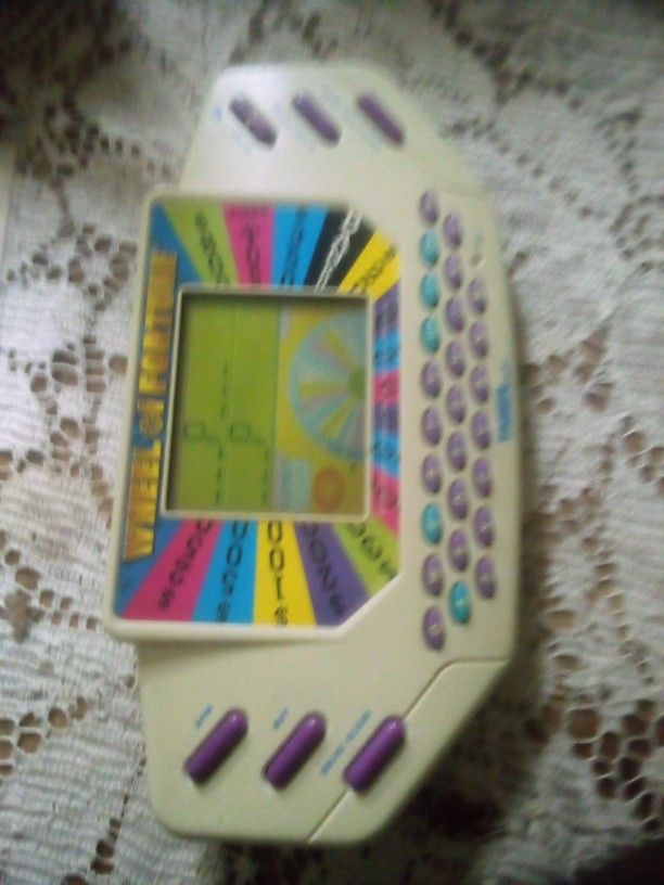 Tiger Handheld Wheel Of Fortune Game
