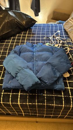 Blue puffer jacket