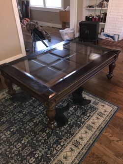 Coffee, table with glass top and in really good condition.