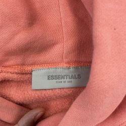 pink essential hoodie
