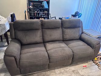 Dark Brown 3 seat Reclining Sofa and 1 recliner