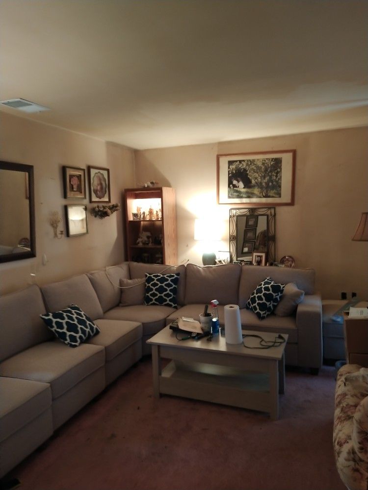 Forbstown Sectional In Light Grey With Ottoman