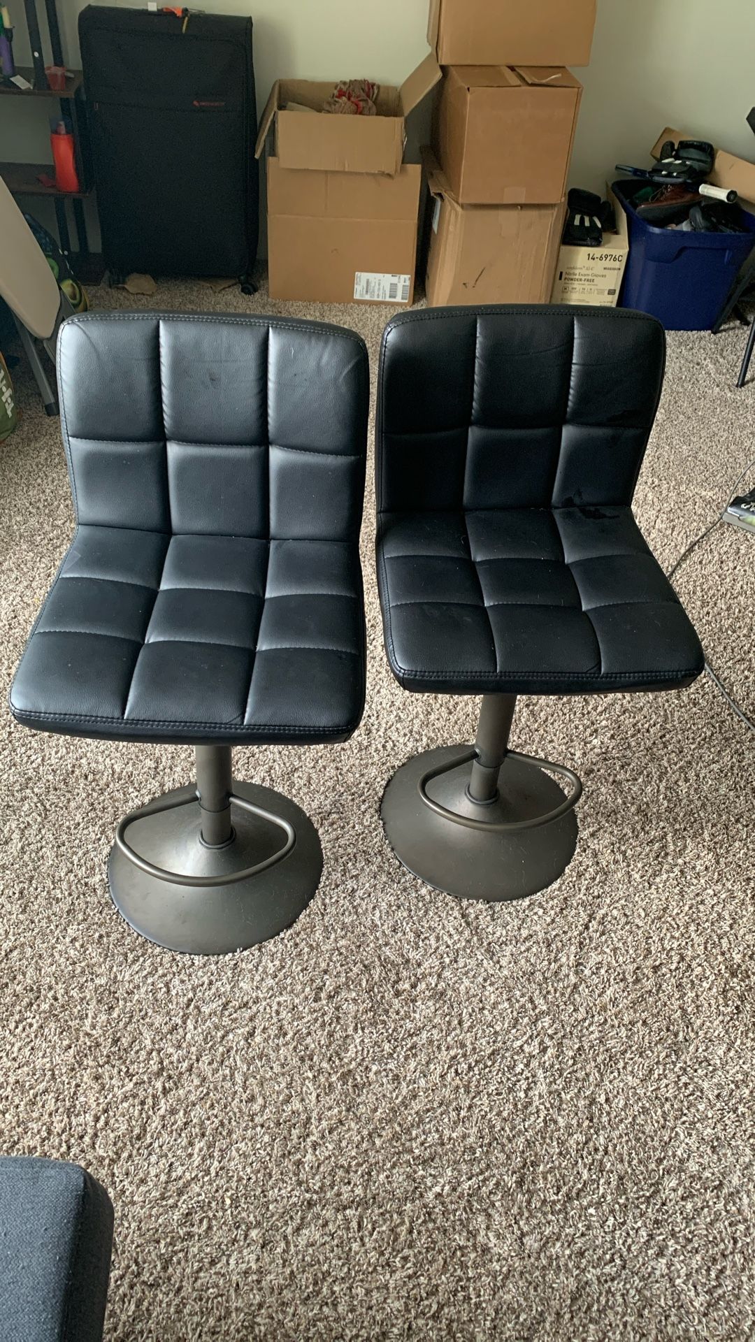 Two adjustable height bar chairs