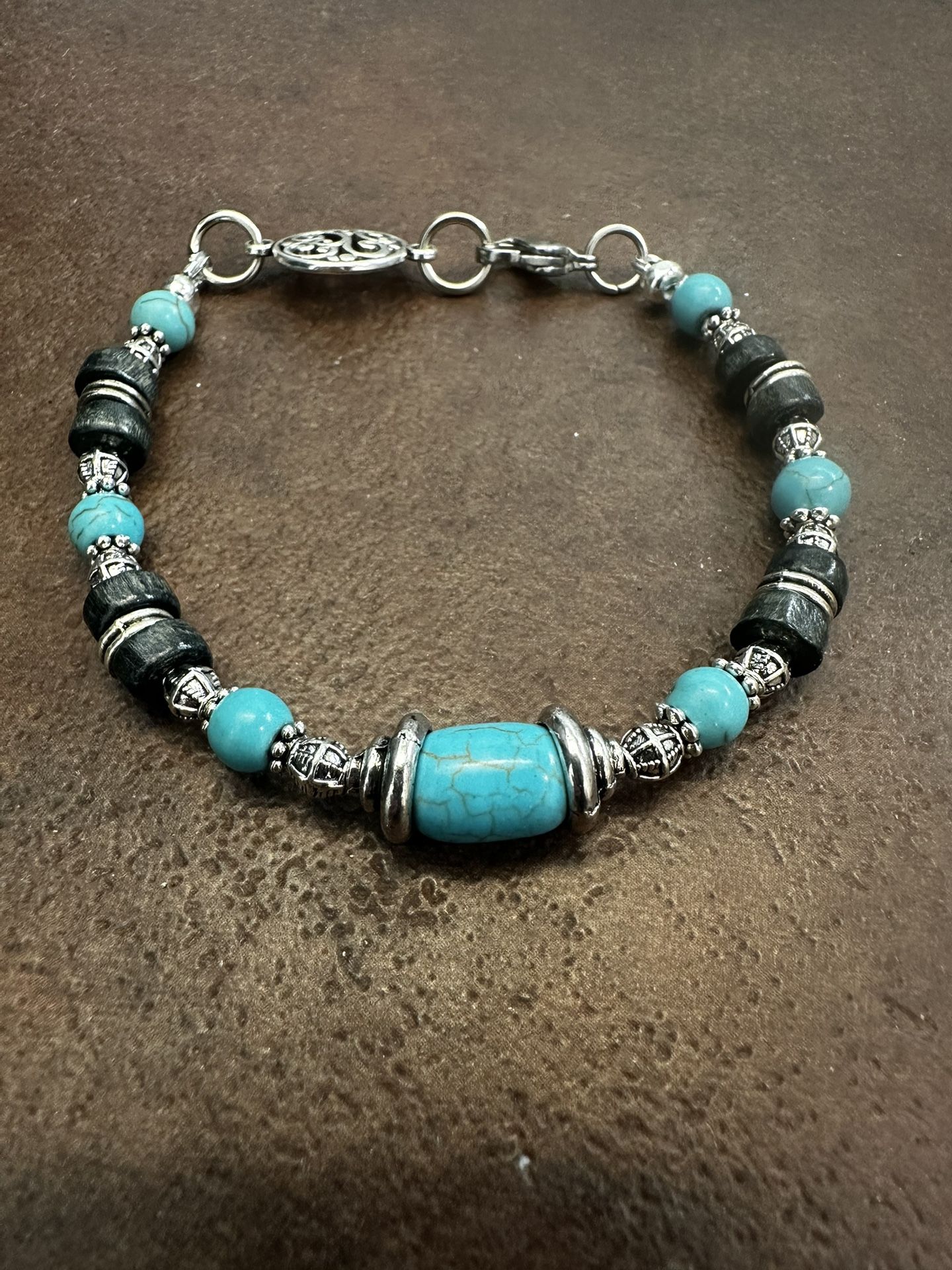Turquoise and Brown Beaded Bracelet with Silver Accents