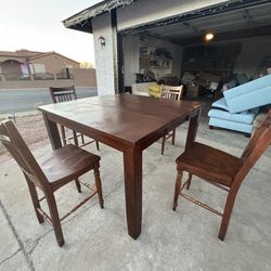 High top dinner table with leaf and 4 chairs,please see all pictures and read details
